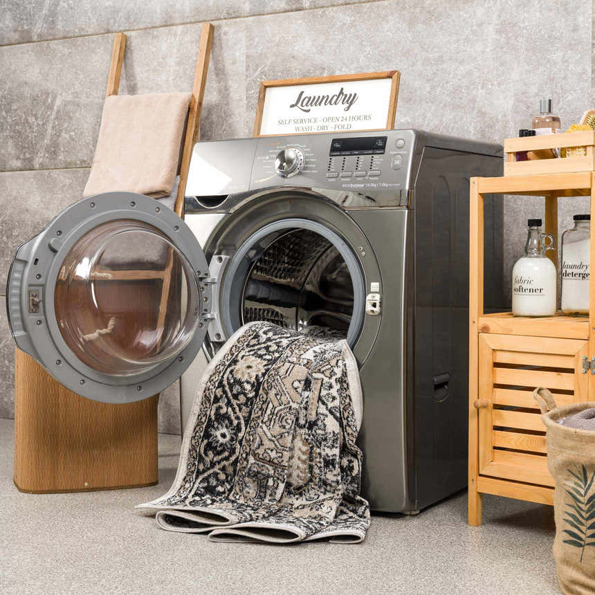 Cabacungan Washable Area Rug being washed in a laundry room with a washing machine and wooden decor. Washing-Machine