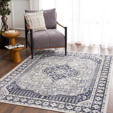 Living room scene with gray armchair on Cabacungan Cream & Gray Washable Area Rug, featuring traditional oriental design. Roomscene-Rectangle