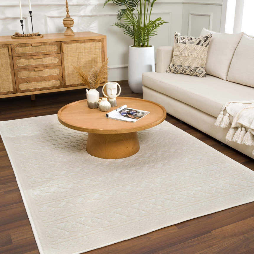 Living room scene with a Fadey White 3D Washable Rug, wood furniture, sofa, and plants for a bright, modern farmhouse look. Roomscene-Rectangle