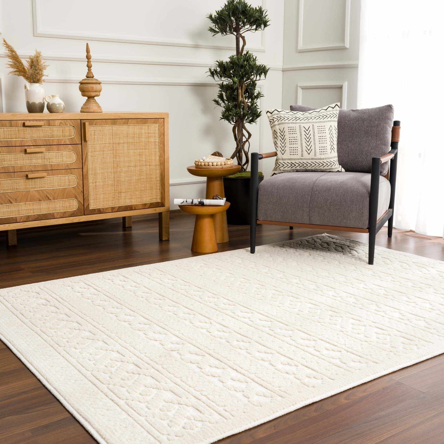 Living room scene with a Fadey White 3D Washable Rug, wood cabinet, gray chair, and decorative plants. Farmhouse style. Roomscene-Rectangle