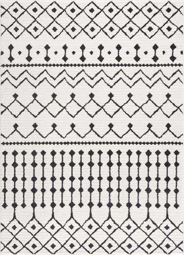 Close-up of the Ringwood Area Rug, a machine woven rug with a black and off-white geometric pattern. Design-Rectangle-5373