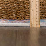 Close-up of Mardin Colorful Area Rug showing rug pile height with ruler. Bohemian style rug texture. Pile