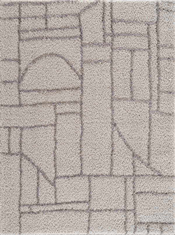 Close-up of the Andia Gray Area Rug, a shag rug with a geometric design in silver and silver-gray polyester. Design-Rectangle-46