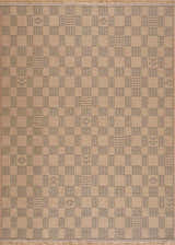 Close-up of the Nairi Checkered Washable Jute Rug. Beige and black checkered pattern with subtle geometric details. Design-Rectangle-46