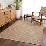 Living room scene with a beige and black Nairi Checkered Washable Jute Rug, woven chairs, and a wooden cabinet. Roomscene-Rectangle