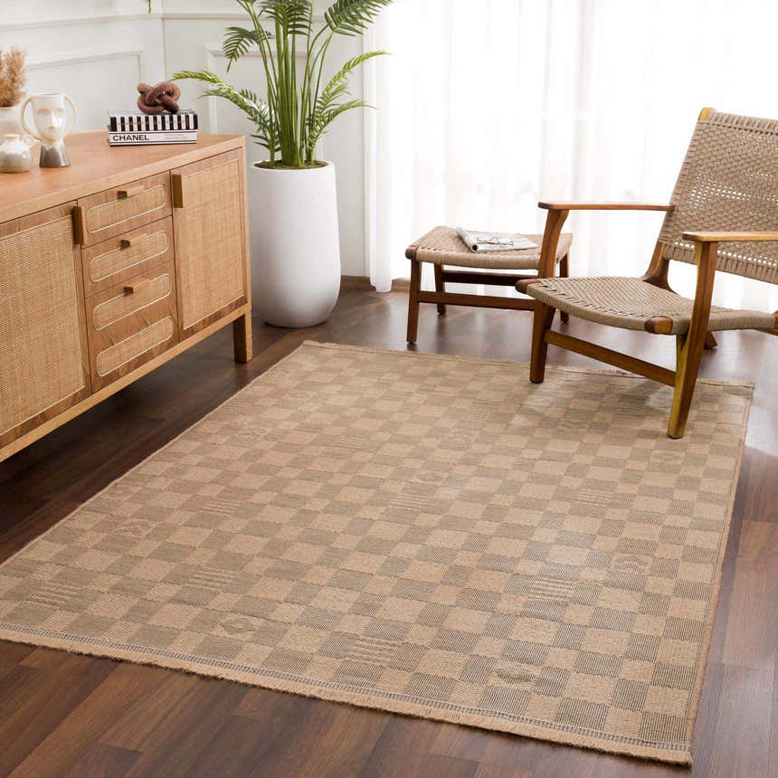 Living room scene with a beige and black Nairi Checkered Washable Jute Rug, woven chairs, and a wooden cabinet. Roomscene-Rectangle