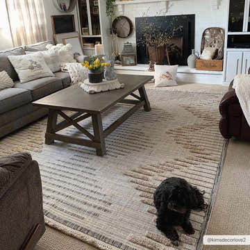 Farmhouse living room with gray sofa and Maulawin High-Low Rustic Rug in charcoal, cream, and gray. Roomscene-Rectangle