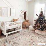 Christmas nursery with white crib and Newkirk Area Rug in brick red, charcoal, cream, and gray. Roomscene-Rectangle