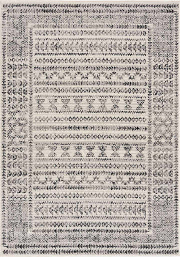 Close-up of the Greig Area Rug. Bohemian style with black, charcoal, and gray geometric patterns on an off-white background. Design-Rectangle-537