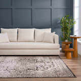 Living room scene with a beige sofa and the Albie Charcoal & Beige Area Rug, creating a modern farmhouse look. Roomscene-Rectangle