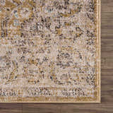 Close-up of Anana Gold & Beige Area Rug showing its traditional pattern, texture, and gold and light beige colors. Swatch