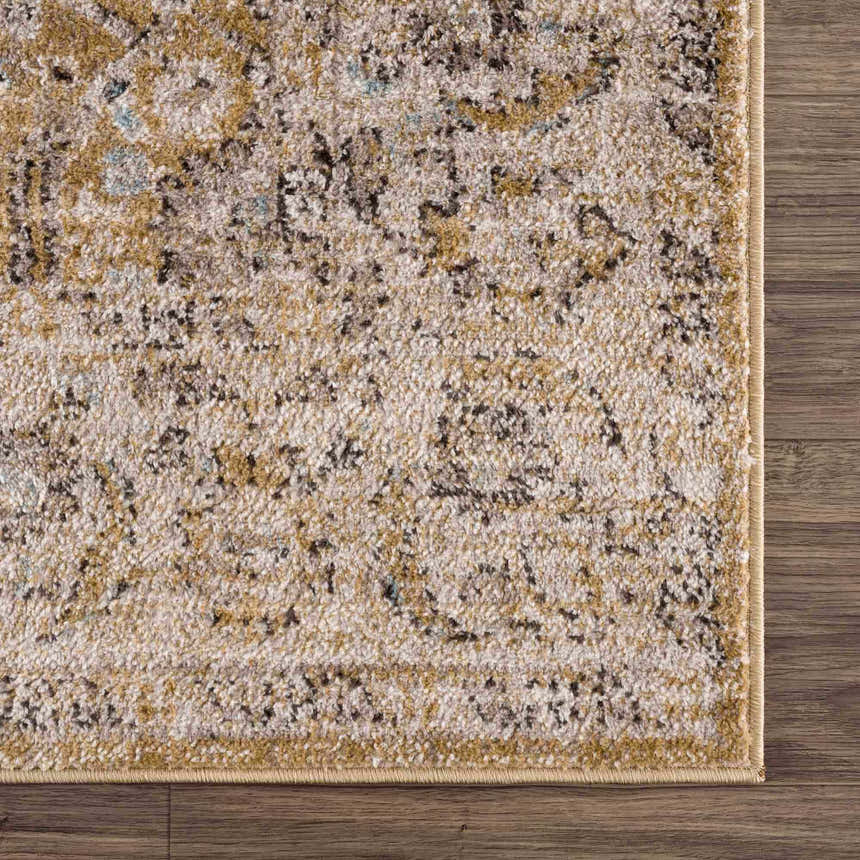 Close-up of Anana Gold & Beige Area Rug showing its traditional pattern, texture, and gold and light beige colors. Swatch