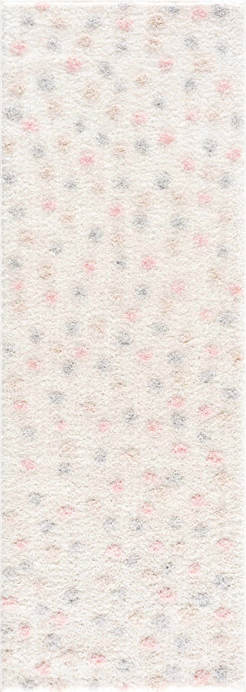 Close-up of the Cansu Pink & Cream Dotted Area Rug. Features a cream shag pile with pink, beige, and gray dotted pattern. Design-Runner-2773