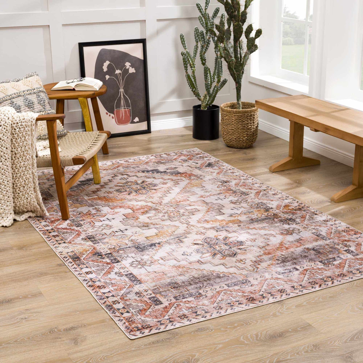 Living room scene with the Isugod Washable Area Rug in beige, brick red, and black, styled with a chair and wooden bench. Roomscene-Rectangle