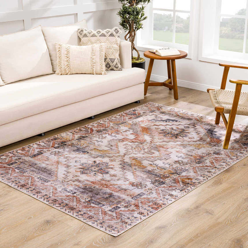 Living room scene with a beige couch and the Isugod Washable Area Rug in beige, brick red, and brown. Roomscene-Rectangle