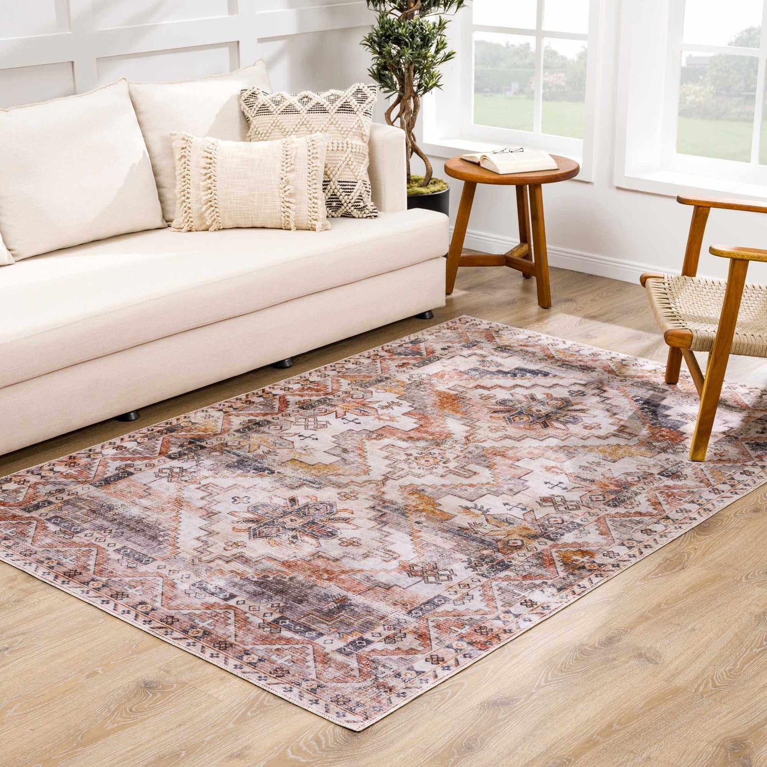 Living room scene with a beige couch and the Isugod Washable Area Rug in beige, brick red, and brown. Roomscene-Rectangle