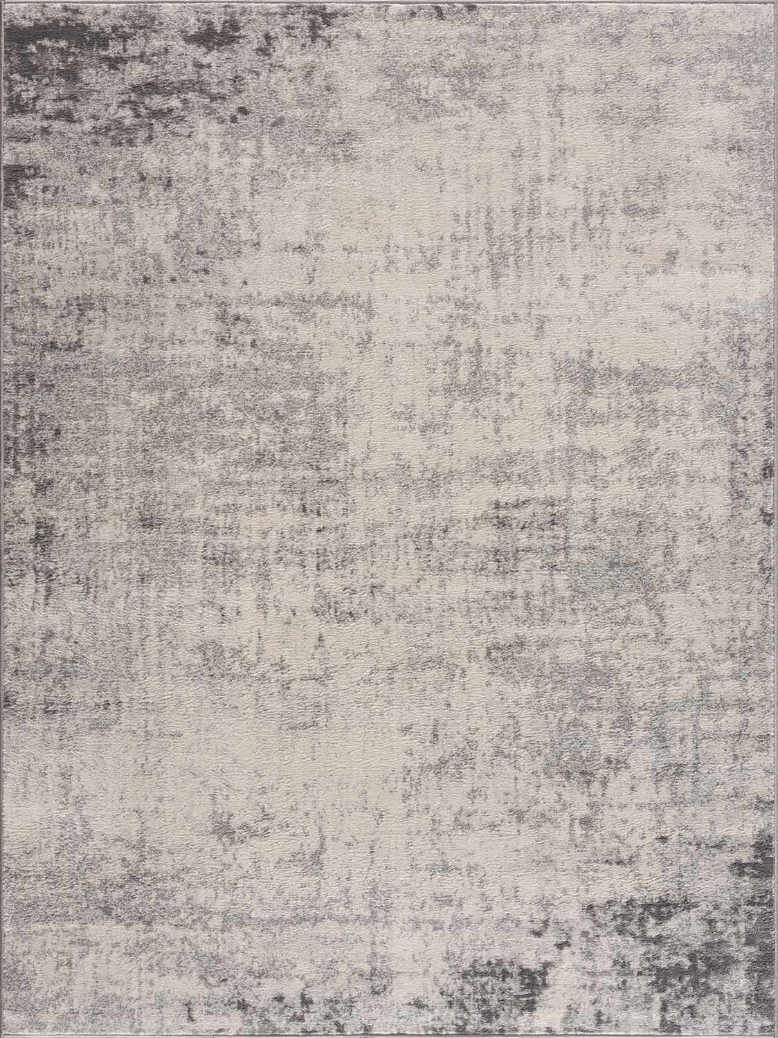 Close-up of the Kalanganan Abstract Gray Rug, featuring a distressed charcoal, gray, and off-white pattern. Design-Rectangle-5371