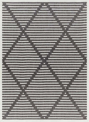 Close-up of the Anah 3D Black Outdoor Rug. Contemporary style with geometric diamond pattern in black, charcoal, and off-white. Design-Rectangle-5373