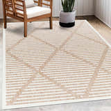 Outdoor patio scene with a geometric Anah Cream outdoor rug, wooden chair, and potted snake plant. Roomscene-Rectangle