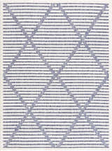 Close-up of the Anah Blue Outdoor Rug. Features a geometric diamond pattern in denim blue and off-white. Contemporary style. Design-Rectangle-537