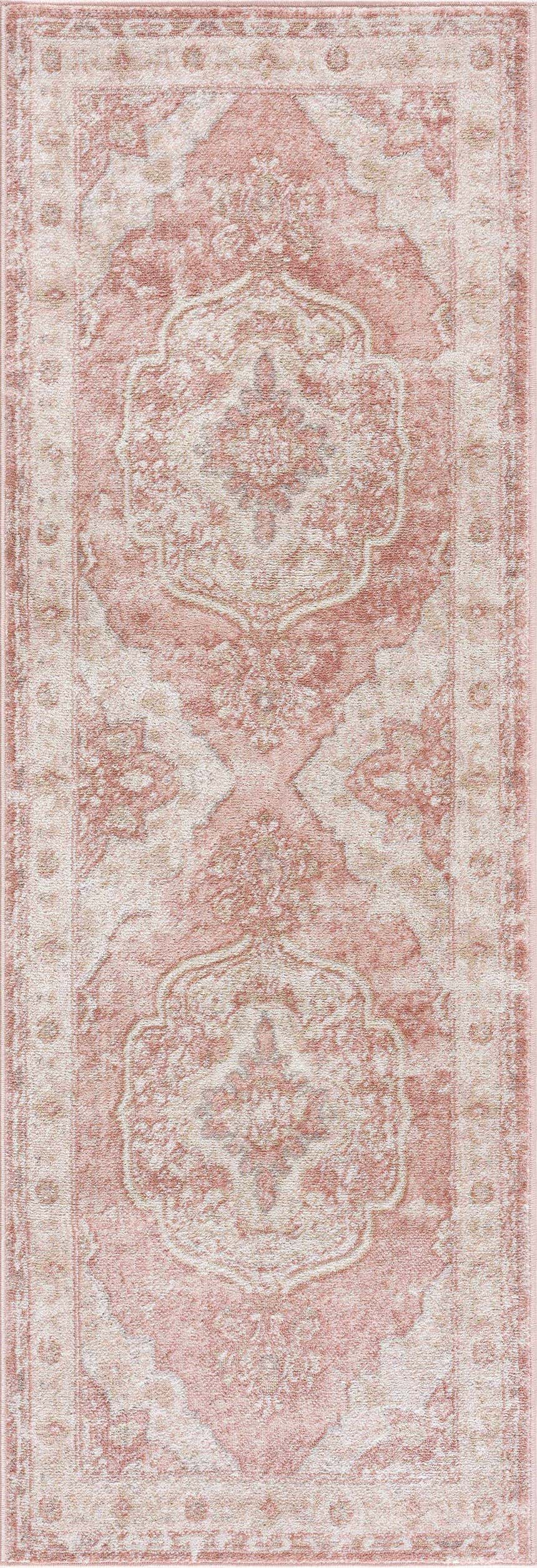 Close-up of the Kandos Blush & Light Pink Area Rug. Features a traditional, oriental pattern in pale pink, cream, and light beige. Design-Runner-2773