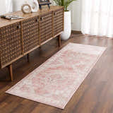 Hallway scene with a Kandos Blush & Light Pink Area Rug, wood console table, and hardwood floors. Neutral, warm, inviting. Roomscene-Runner