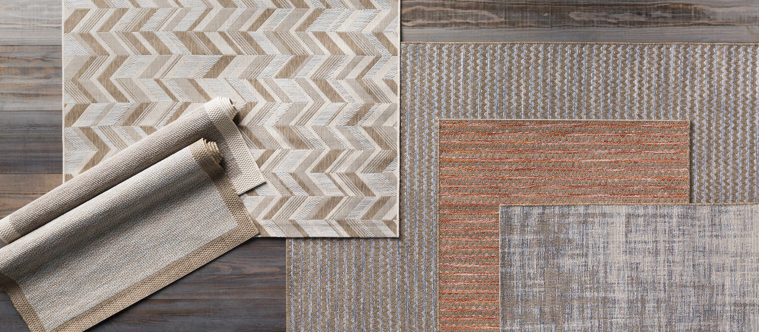 Close-up of Manzanita Area Rug with blue, cream, taupe colors. Contemporary geometric, chevron, and textured patterns. Styleshot