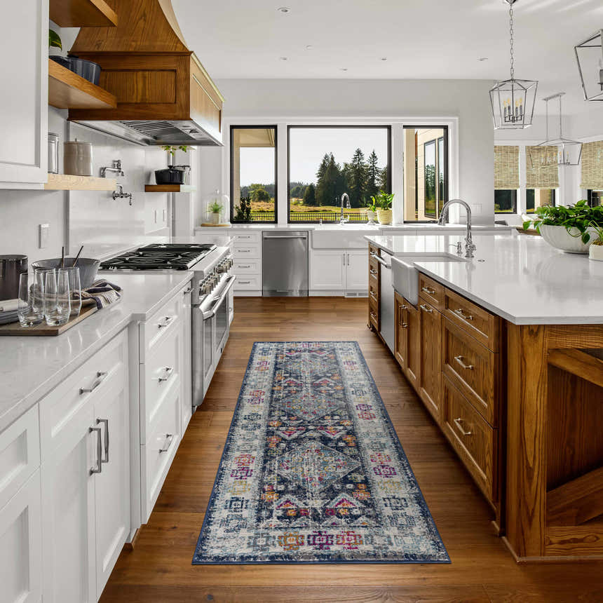 Bright kitchen with Tigriv Navy 2313 runner rug. Bohemian style rug with navy, blue, and pink tones on hardwood floor. Roomscene-Runner