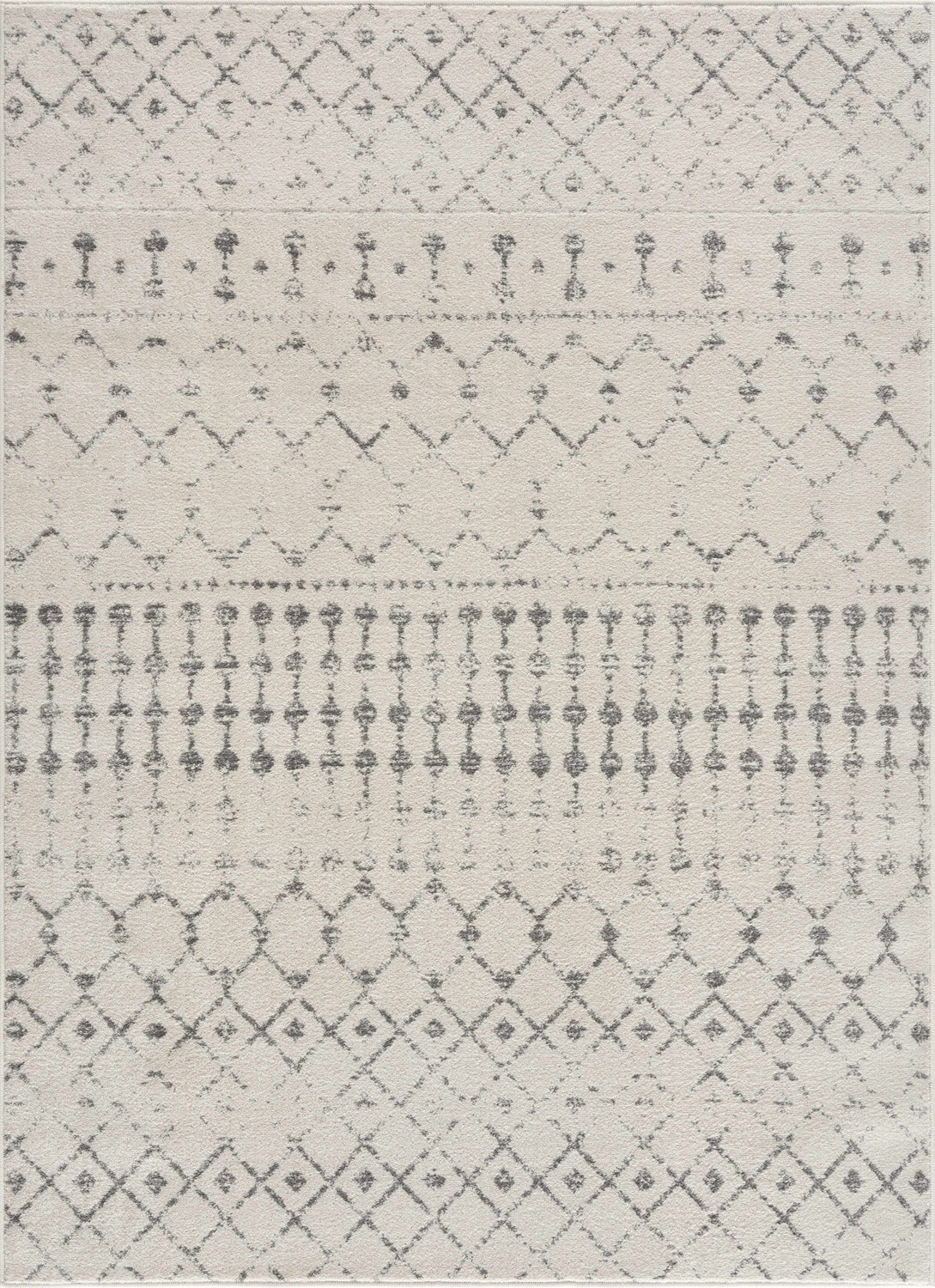Close-up of the Marash KMRSH-4606 area rug, showcasing its cream and gray geometric pattern and soft polypropylene texture. Design-Rectangle
