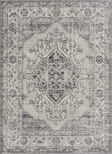 Close-up of the Marash KMRSH-4615 area rug in black, gray, and ivory. Traditional bohemian design with a distressed texture. Design-Rectangle
