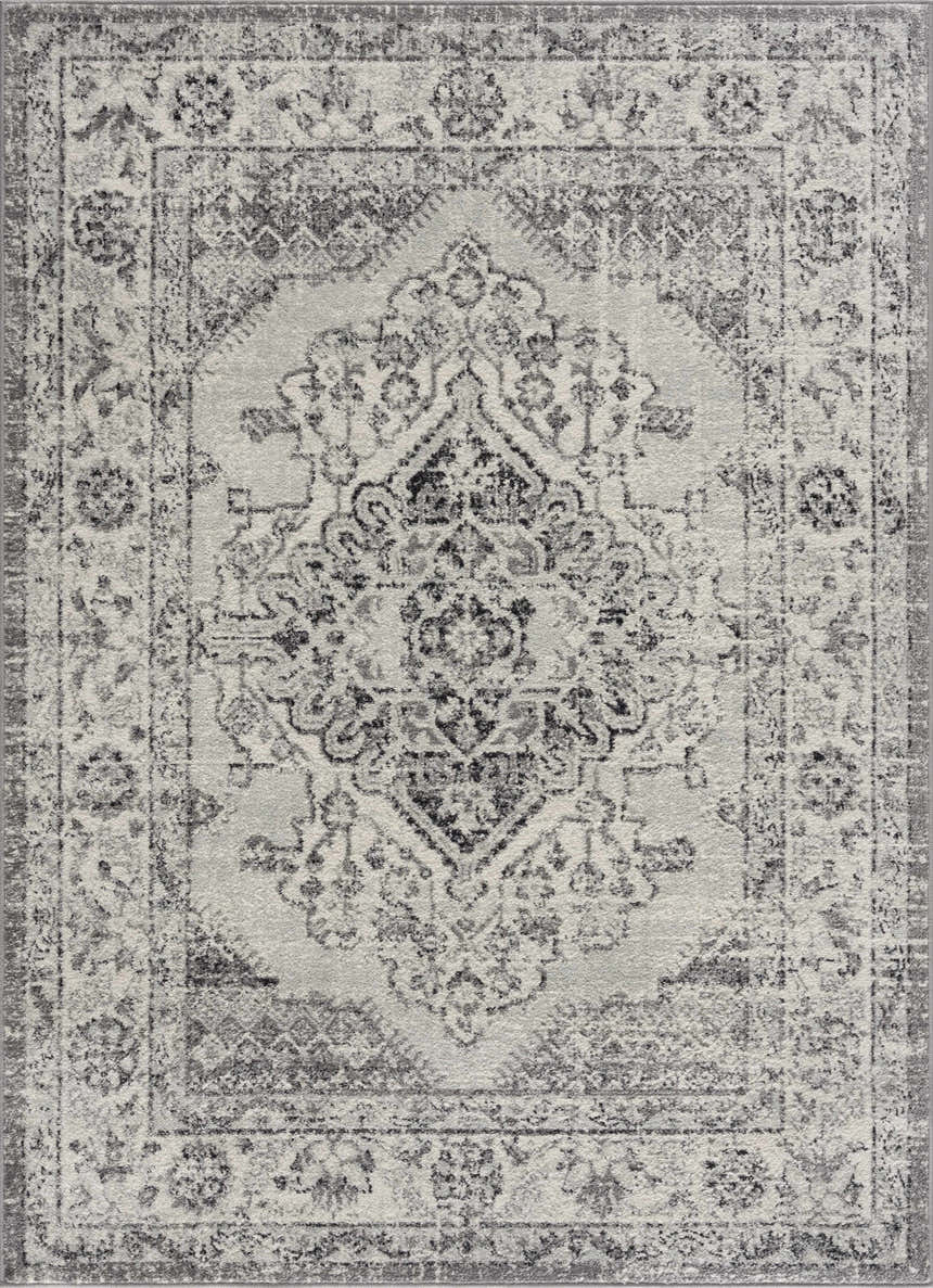 Close-up of the Marash KMRSH-4615 area rug in black, gray, and ivory. Traditional bohemian design with a distressed texture. Design-Rectangle
