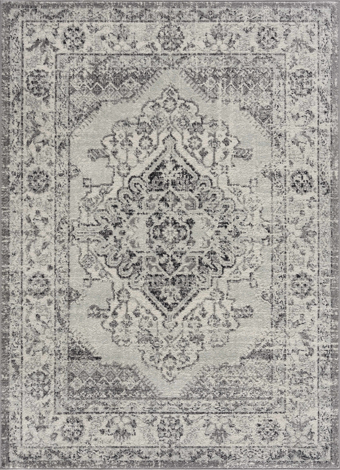 Close-up of the Marash KMRSH-4615 area rug in black, gray, and ivory. Traditional bohemian design with a distressed texture. Design-Rectangle