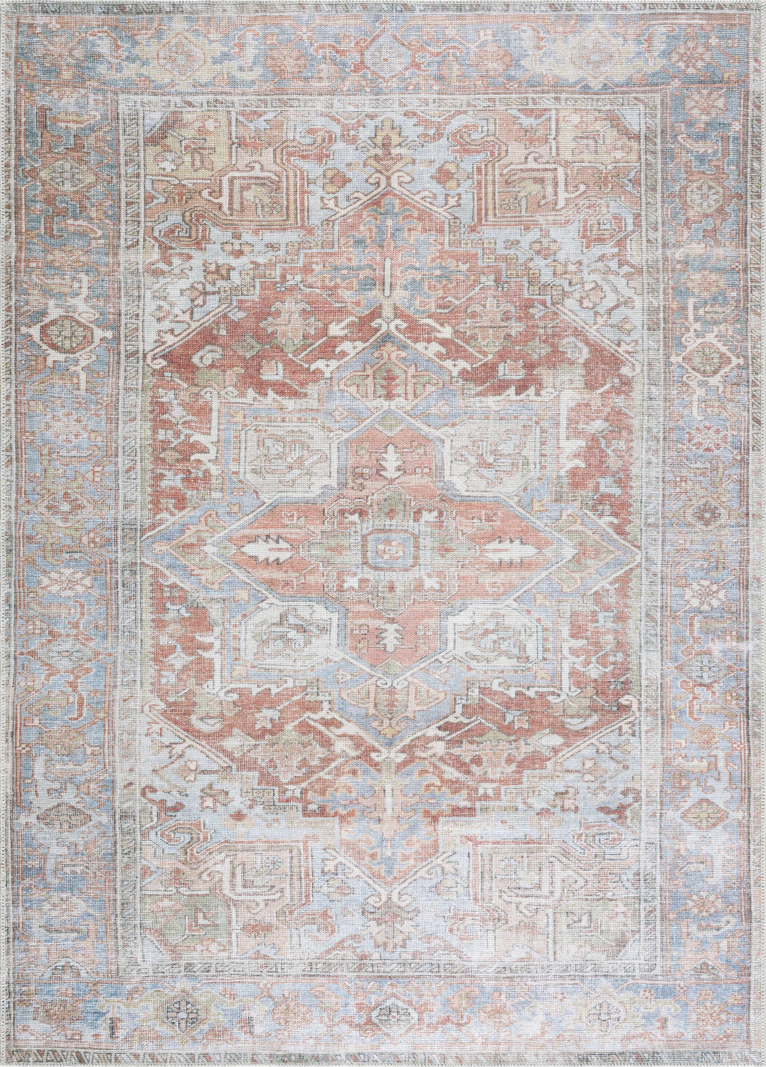 Detailed view of the Rust Maayon Washable Rug featuring a traditional oriental pattern in brick red, brown, and denim blue. Design-Rectangle