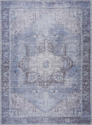 Close-up of the Pays Area Rug. Machine-woven rug in gray, sky blue, and anthracite with a traditional oriental pattern. Design-Rectangle