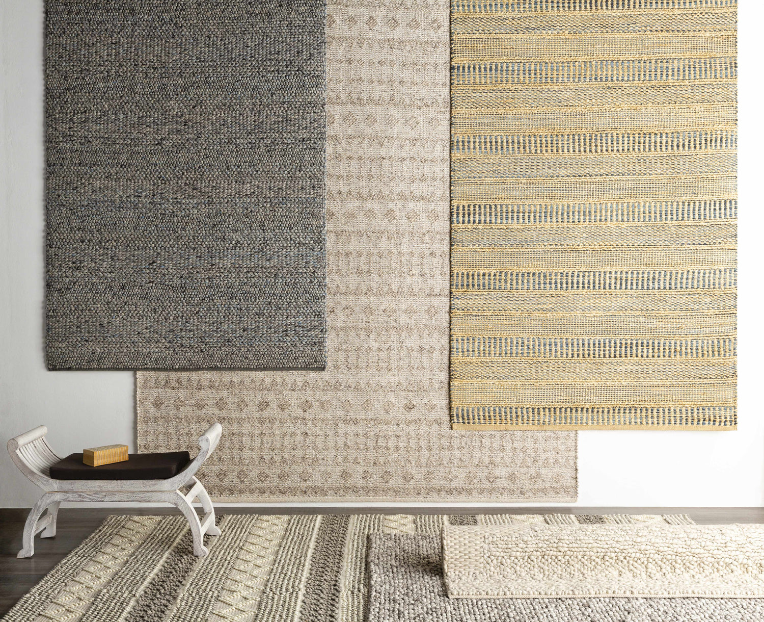 Bohemian rug display: Whittington Gray&Cream Wool Rug with geometric patterns, hand woven texture, and neutral color palette. Styleshot
