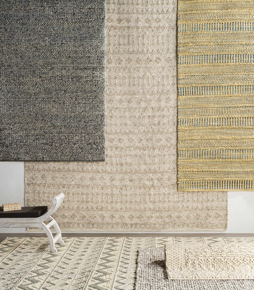 Room scene with Whittington Gray&Cream Wool Rug. Bohemian, contemporary rug display with gray, cream, and yellow tones. Styleshot