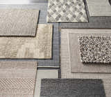 Various textures and patterns of Keldron Clearance Rugs in charcoal, cream, and brown tones. Contemporary style. Texture
