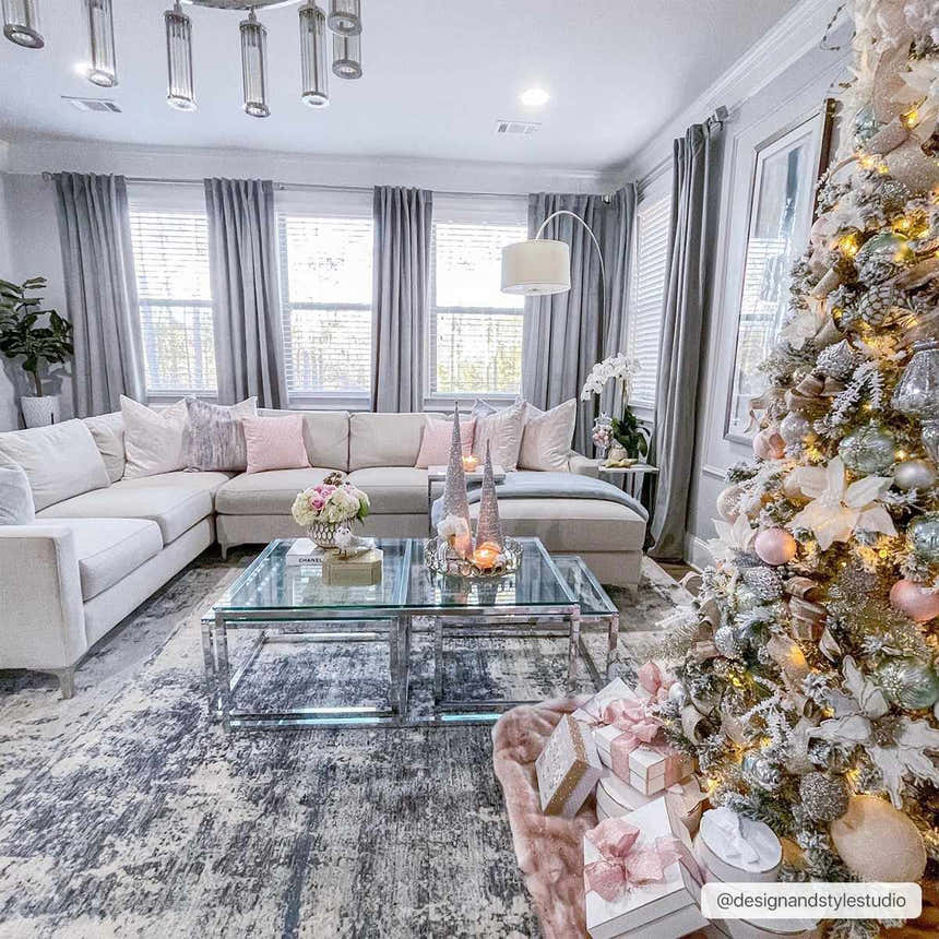 Living room with Christmas tree and Tonalea Carved Statement Area Rug in blue, gray, and ivory tones. Roomscene-Rectangle