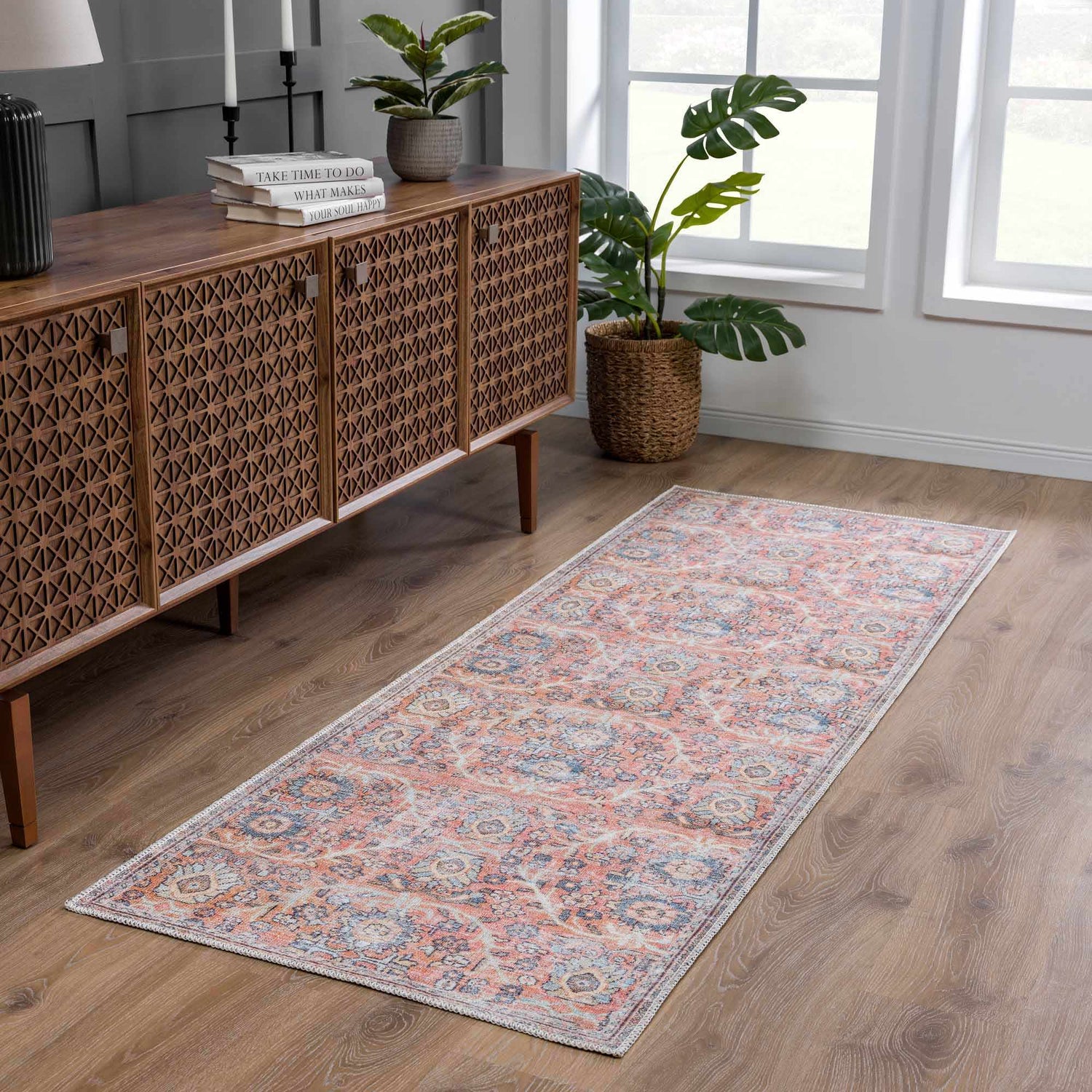 Entryway with Urpi Rose & Blue Washable Area Rug runner, wood console table, plants, and wood floors. Farmhouse style. Roomscene-Runner
