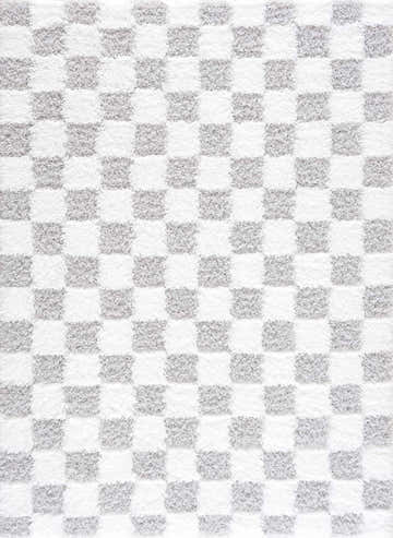 Close-up of the Atira Gray Checkered Area Rug. Light gray and white shag rug with a contemporary geometric checkerboard pattern. Design-Rectangle-537