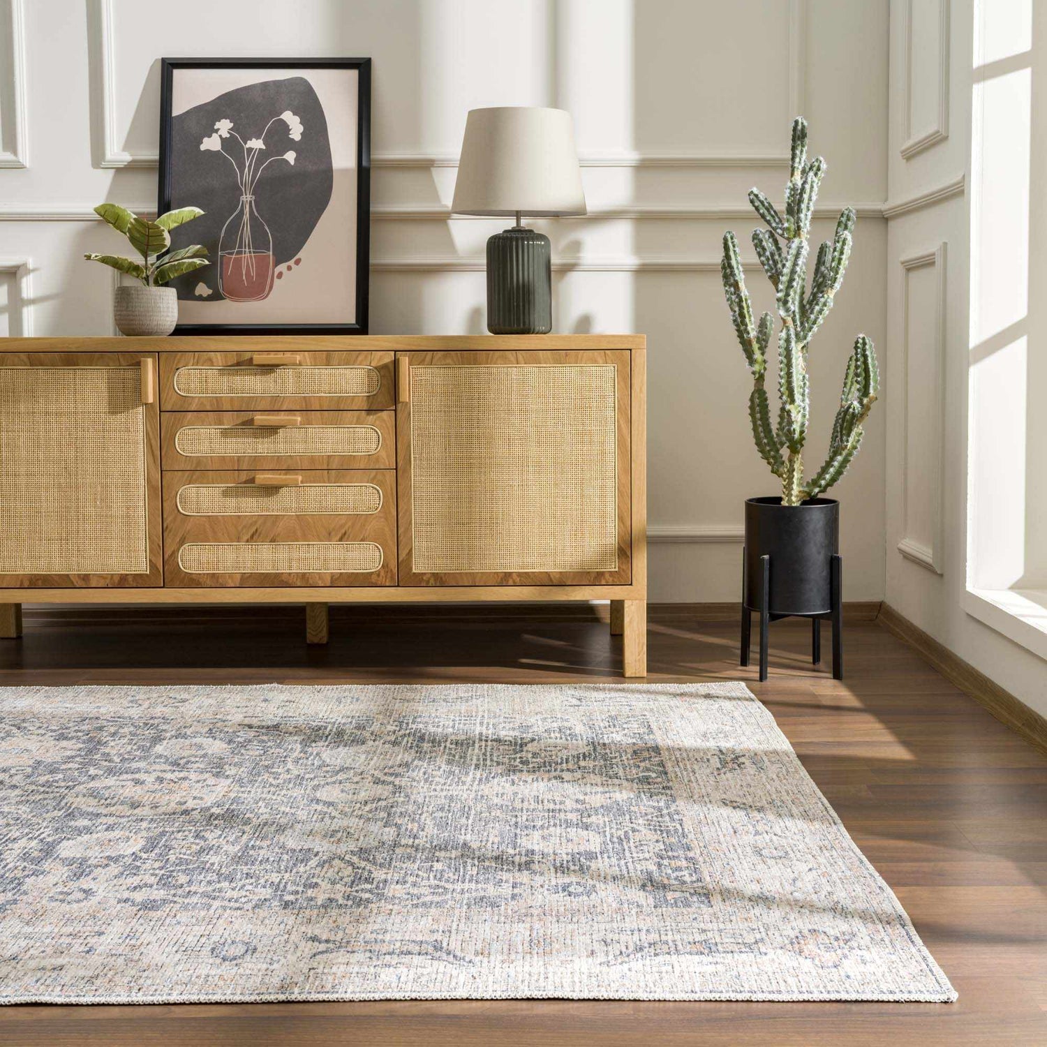 Living room scene with silver Kayin Washable Rug, wood console table, lamp, and cactus. Farmhouse style. Roomscene-Rectangle