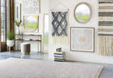 Styled room scene with Atulayan Premium Rug in light gray, blue, and coral. Bohemian decor, console table, and modern accents. Styleshot