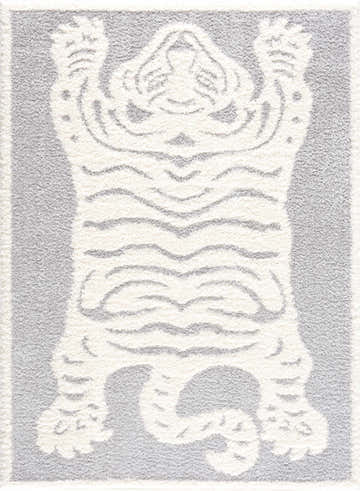 Close-up of Zane Gray Tibetan Tiger Area Rug featuring cream tiger design on light gray polyester. Shag texture. Design-Rectangle-46