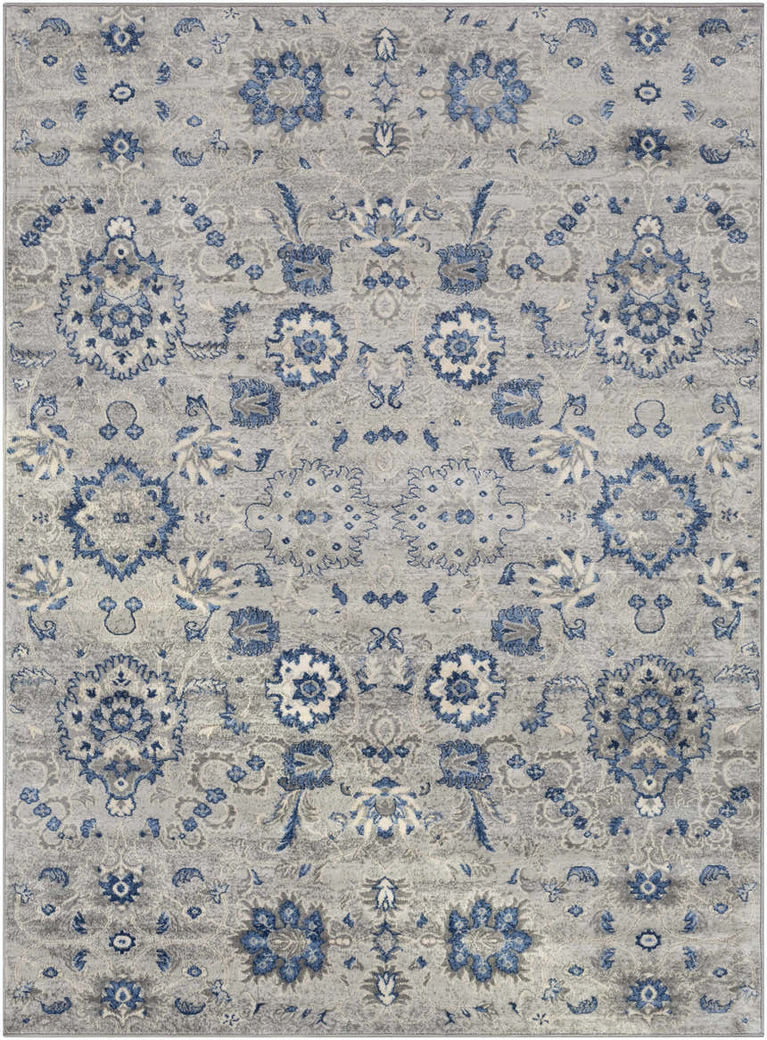 Close-up of the Adairsville Blue Floral Area Carpet, featuring a traditional denim and gray floral pattern. Design-Rectangle-5373