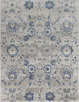Detailed floral pattern of the Adairsville Blue Floral Area Carpet in denim, gray, and ivory tones. Design-Rectangle-710103