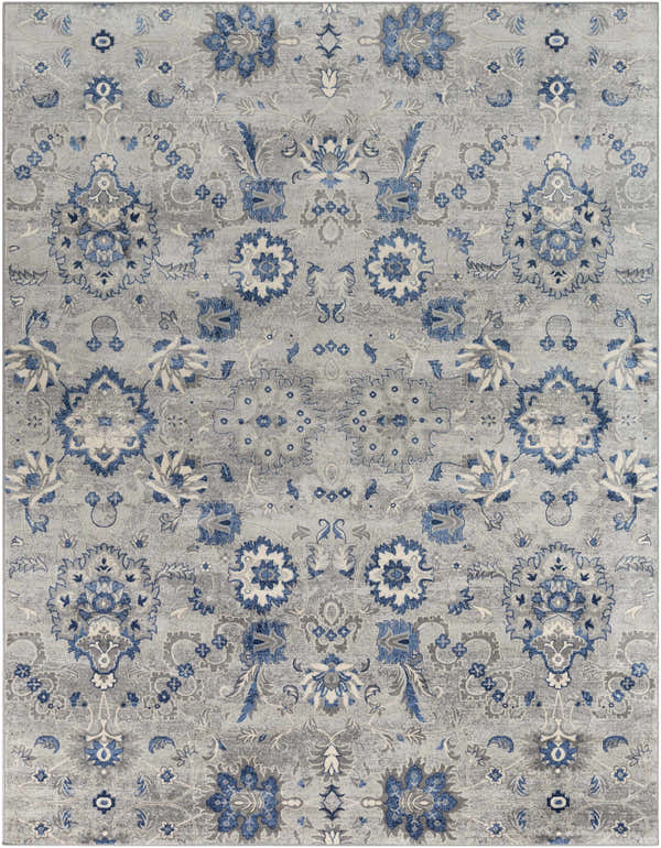 Detailed floral pattern of the Adairsville Blue Floral Area Carpet in denim, gray, and ivory tones. Design-Rectangle-710103