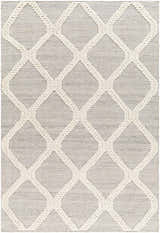 Close-up of the Adora Area Rug. Bone geometric pattern on a cloud gray background. Hand woven texture. Design-Rectangle-576