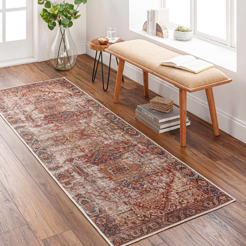 Entryway scene with a burgundy and navy Adtugan Vintage Flat Pile Washable Rug on a wood floor. Bench, side table, and plants. Roomscene-Runner
