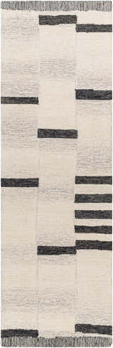 Close-up of the Aibonito Rug. Hand-tufted wool rug with a geometric pattern in beige and black. Contemporary style. Design-Runner-268