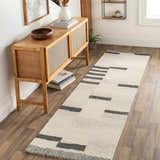 Entryway with wood console table and Aibonito Hand Tufted Wool Area Rug runner in beige and black. Roomscene-Runner